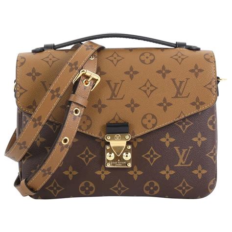 louis vuitton monogram canvas pochette metis bag|louis vuitton reverse metis.